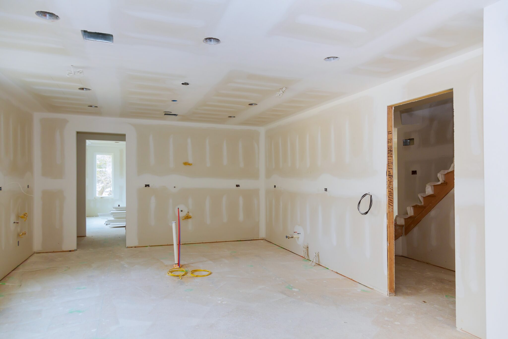 Drywall is hung in kitchen remodeling project Interior of apartment with materials during on the renovation